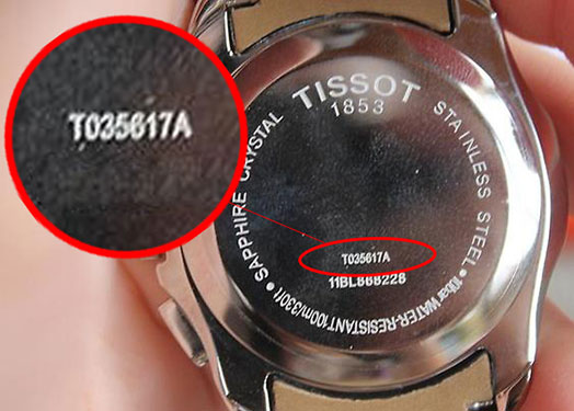 Backside of Tissot watch with model code magnified