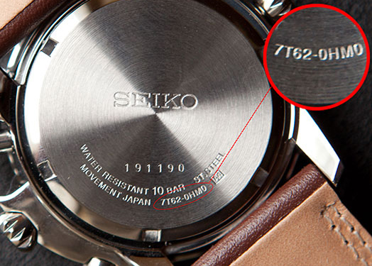 Backside of Seiko watch with model code magnified